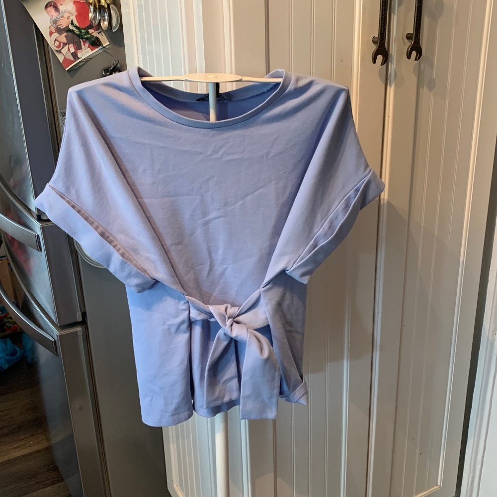 Express front tie nylon and spandex top. Worn once.